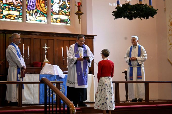 Bishop Paul Smith delivers Karen's Rite of Installation