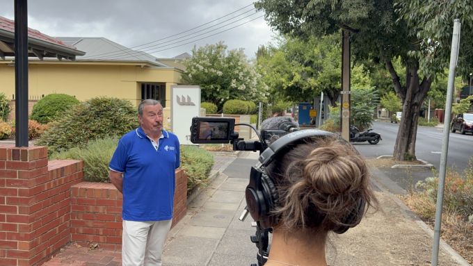 Jonathan fronts the camera for an interview.