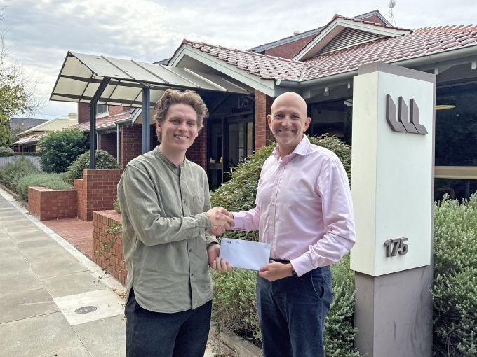 Scott Ross awards a Mission Outreach Grant.