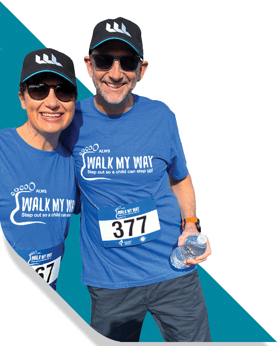 Grow more than interest - Two people in blue tshirts walk for a charity